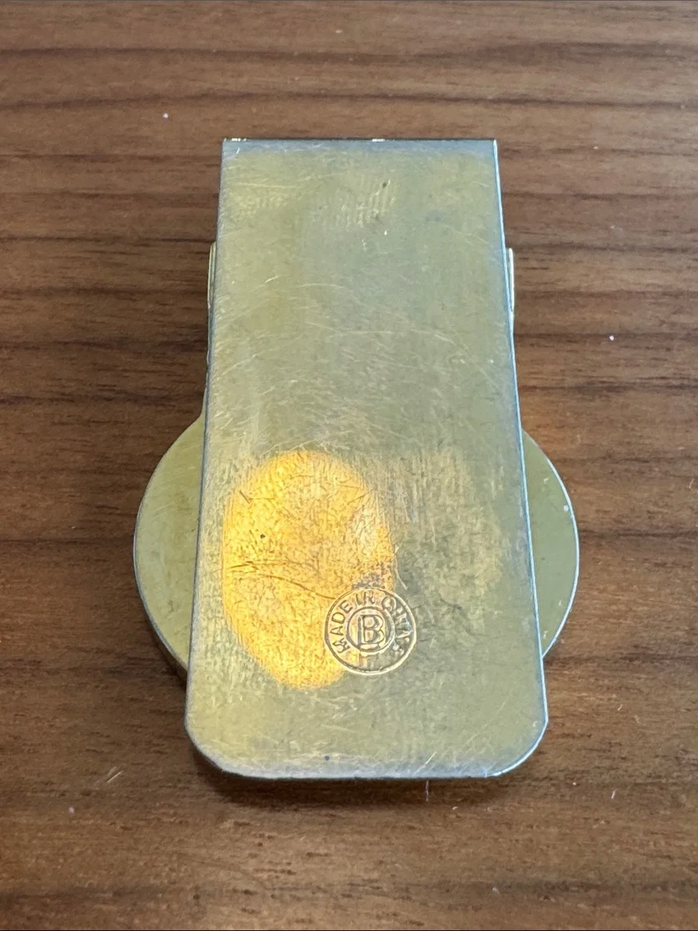 Vintage Gold-tone Money Clip with Abstract Black Logo